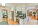 Open kitchen featuring stainless appliances, gas range, and convenient access to living areas at 308 Rainbow Dr, Carrboro, NC 27510