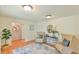 Cozy living room featuring hardwood floors, neutral decor, and comfortable seating at 308 Rainbow Dr, Carrboro, NC 27510