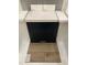 Interior design selection showcasing dark cabinets, light countertops and backsplash, and wood look floors at 323 Chesapeake Cmns St # 104, Garner, NC 27529