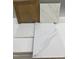 Interior design selection featuring light-stained cabinets, patterned quartz countertop, and coordinating backsplash tiles at 323 Chesapeake Cmns St # 104, Garner, NC 27529