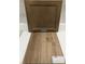 Interior design selections showcasing cabinet finish and luxury vinyl flooring sample with product details at 339 Chesapeake Cmns St # 108, Garner, NC 27529