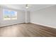 Bedroom featuring new floors, crown molding, and a ceiling fan at 3409 Lemon Springs Rd, Sanford, NC 27332