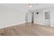 Bedroom with large window, ceiling fan, and ensuite bathroom access at 3409 Lemon Springs Rd, Sanford, NC 27332
