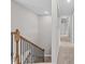 Upper hallway features modern lighting and access to bedrooms and bathrooms at 3409 Lemon Springs Rd, Sanford, NC 27332