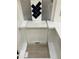 Interior design elements showcase navy backsplash, white cabinets, and light wood flooring at 343 Chesapeake Cmns St # 109, Garner, NC 27529