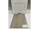 Interior design elements showcase white cabinets and light wood flooring at 343 Chesapeake Cmns St # 109, Garner, NC 27529