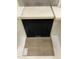 Interior design elements showcase black cabinets and light wood flooring at 343 Chesapeake Cmns St # 109, Garner, NC 27529