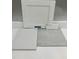 Interior design elements showcase white cabinets, white countertops, and light gray tiling at 343 Chesapeake Cmns St # 109, Garner, NC 27529