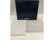 Interior design elements showcase navy cabinets, white countertops, and light gray tiling at 343 Chesapeake Cmns St # 109, Garner, NC 27529