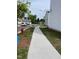 Street view in the community with sidewalks and townhome architecture at 3604 Soaring Elm Dr, Durham, NC 27703
