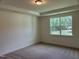 Bedroom with large window for natural light at 38 Gander Dr, Benson, NC 27504