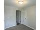 Neutral bedroom features doors, neutral walls, and neutral carpet at 42 Hemming Ct, Cameron, NC 28326