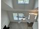 Bright living room with a ceiling fan and a skylight, complemented by a cozy fireplace and neutral carpet at 42 Hemming Ct, Cameron, NC 28326