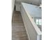 Carpeted staircase with white trim leading to an open-concept living space at 42 Hemming Ct, Cameron, NC 28326