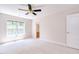 Bedroom with natural light from the window and an ensuite bathroom at 4404 Triland Way, Cary, NC 27518