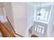 Bright foyer with a chandelier and transom window above the front door at 4404 Triland Way, Cary, NC 27518