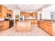 Well-lit kitchen featuring an island, stainless steel appliances, and ample counter space at 4404 Triland Way, Cary, NC 27518