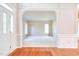 Spacious living room featuring a neutral color palette, hardwood floors and natural light at 4404 Triland Way, Cary, NC 27518