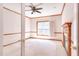 Bright office space featuring natural light, crown molding, fireplace and a ceiling fan at 4404 Triland Way, Cary, NC 27518