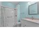 Bathroom featuring a shower, a grab bar, and a vanity with a granite countertop at 4705 Forest Highland Dr, Raleigh, NC 27604