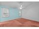 Bedroom featuring two windows that let in natural light and a ceiling fan at 4705 Forest Highland Dr, Raleigh, NC 27604