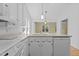Kitchen featuring white cabinets, granite countertops, and stainless steel appliances at 4705 Forest Highland Dr, Raleigh, NC 27604