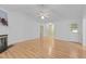 Bright living room with fireplace and doorways to other spaces at 4705 Forest Highland Dr, Raleigh, NC 27604