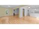 Spacious living room showcasing hardwood flooring and easy access to the kitchen at 4705 Forest Highland Dr, Raleigh, NC 27604