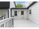 White deck with multiple access points offering a seamless indoor-outdoor transition at 4713 Erwin Rd, Durham, NC 27705