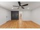 Hardwood floors and recessed lighting enhance this living area's modern aesthetic appeal at 4713 Erwin Rd, Durham, NC 27705