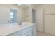 Bathroom with a white vanity and a large mirror at 48 Sanders Farm Dr, Smithfield, NC 27577