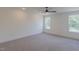 Spacious bedroom featuring neutral carpet, recessed lighting, and windows for natural light at 48 Sanders Farm Dr, Smithfield, NC 27577