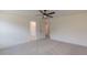 Bedroom featuring neutral carpet, with an ensuite bathroom and walk-in closet visible at 48 Sanders Farm Dr, Smithfield, NC 27577
