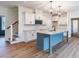 Modern kitchen featuring a large island and stainless steel appliances at 48 Sanders Farm Dr, Smithfield, NC 27577