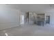 Expansive living area with open staircase, kitchen and featuring modern trim and spacious design with natural light at 48 Sanders Farm Dr, Smithfield, NC 27577