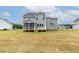 Back of the house showing the screened in porch and back yard at 48 Sanders Farm Dr, Smithfield, NC 27577