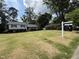 Well-manicured lawn and landscaping welcome you to this charming two-story home at 4813 Glen Forest Dr, Raleigh, NC 27612