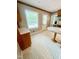 Charming kitchen featuring a round table, bright window, and tile flooring at 4813 Glen Forest Dr, Raleigh, NC 27612