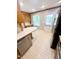 Cozy kitchen featuring stainless steel appliances, a breakfast bar and an adjacent dining area at 4813 Glen Forest Dr, Raleigh, NC 27612