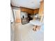 Well-lit kitchen with stainless steel appliances, ample counter space, and cozy breakfast nook at 4813 Glen Forest Dr, Raleigh, NC 27612