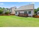 Backyard featuring a deck and swing set at 508 Minerva Dale Dr, Fuquay Varina, NC 27526