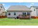 Backyard featuring a deck, a built-in grill and a swing set at 508 Minerva Dale Dr, Fuquay Varina, NC 27526