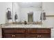 Bathroom featuring a double vanity with granite countertops and modern fixtures, offering ample space at 508 Minerva Dale Dr, Fuquay Varina, NC 27526