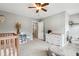 Charming Bedroom with a crib, changing table, and decorative bookshelf for a comfortable baby's room at 508 Minerva Dale Dr, Fuquay Varina, NC 27526