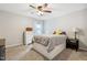 Bedroom featuring a dresser, bedside table, and drawers under bed for storage at 508 Minerva Dale Dr, Fuquay Varina, NC 27526