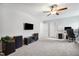 Spacious bonus room with wall mounted TV, ceiling fan, and plenty of room at 508 Minerva Dale Dr, Fuquay Varina, NC 27526