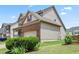 A lovely brick and vinyl siding two-story home with an attached garage, landscaping, and a well-maintained lawn at 508 Minerva Dale Dr, Fuquay Varina, NC 27526
