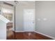 Entryway with hardwood floors, and front door with decorative window at 5416 Kissimmee Ln, Raleigh, NC 27616