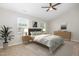 Comfortable main bedroom featuring a ceiling fan and plenty of natural light at 5416 Kissimmee Ln, Raleigh, NC 27616