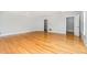 A large living room offers ample space, hardwood floors, and great light at 5513 Parkwood Dr, Raleigh, NC 27612